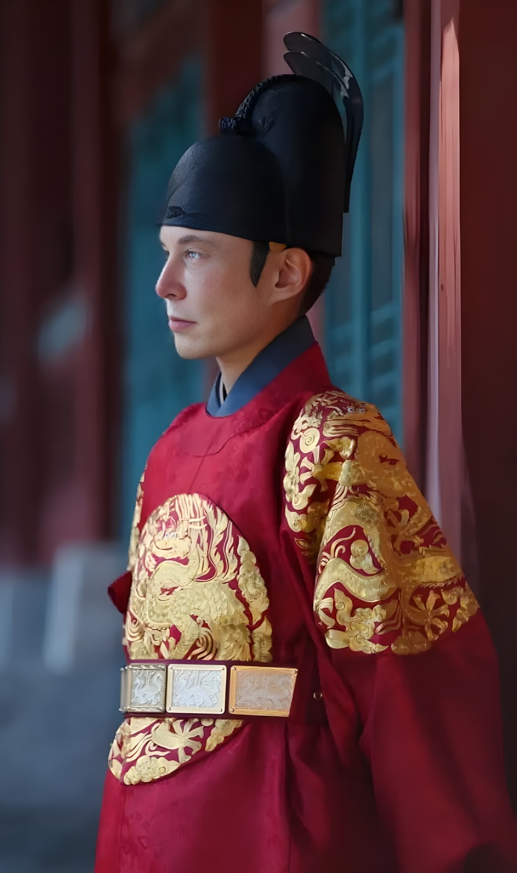 in traditional chinese clothing is standing in front of a building